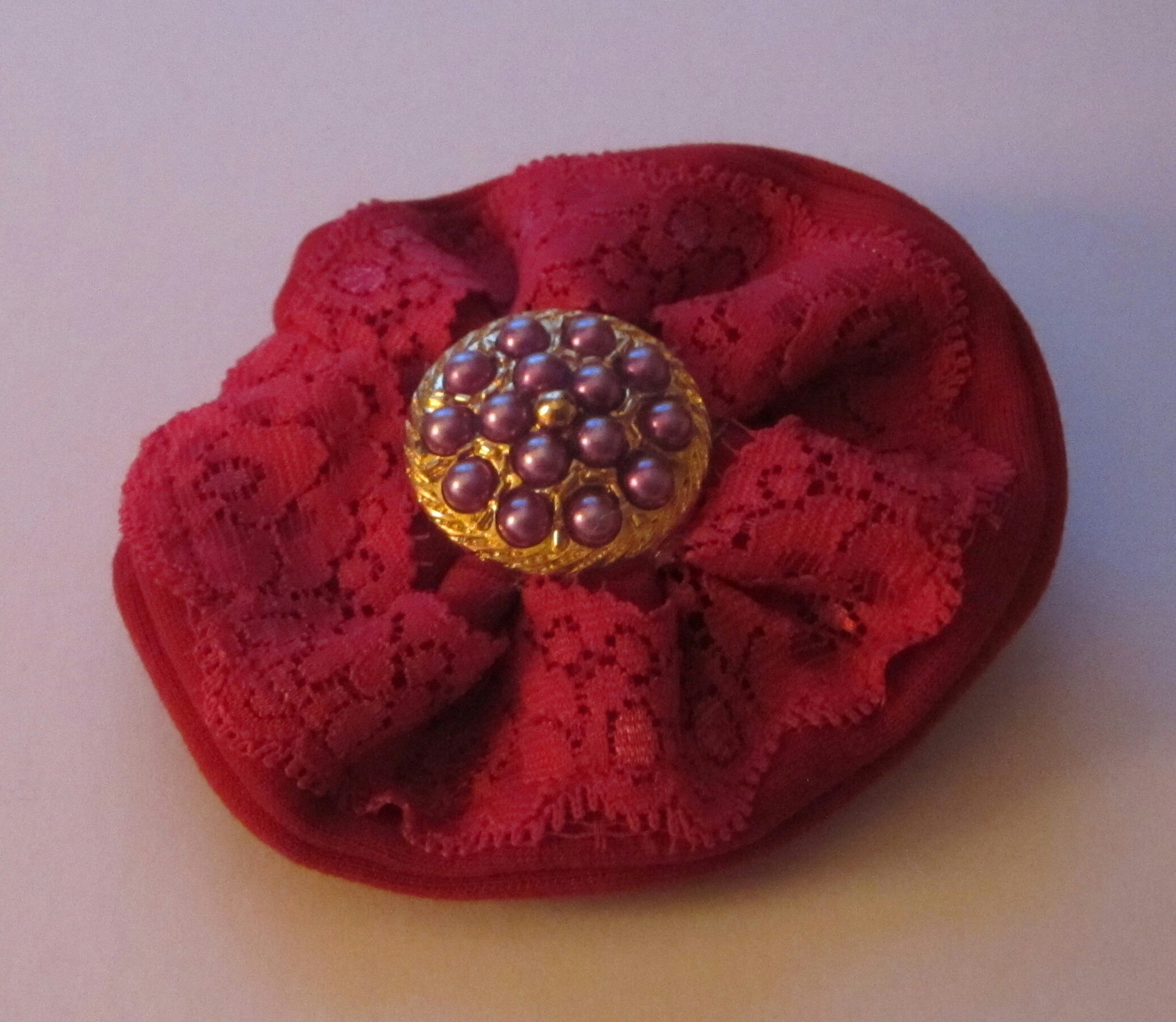 Ladies Red Corsage with Gold and Purple Button Centre - Style Showroom 